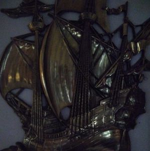 Gold toned ship wall hanging